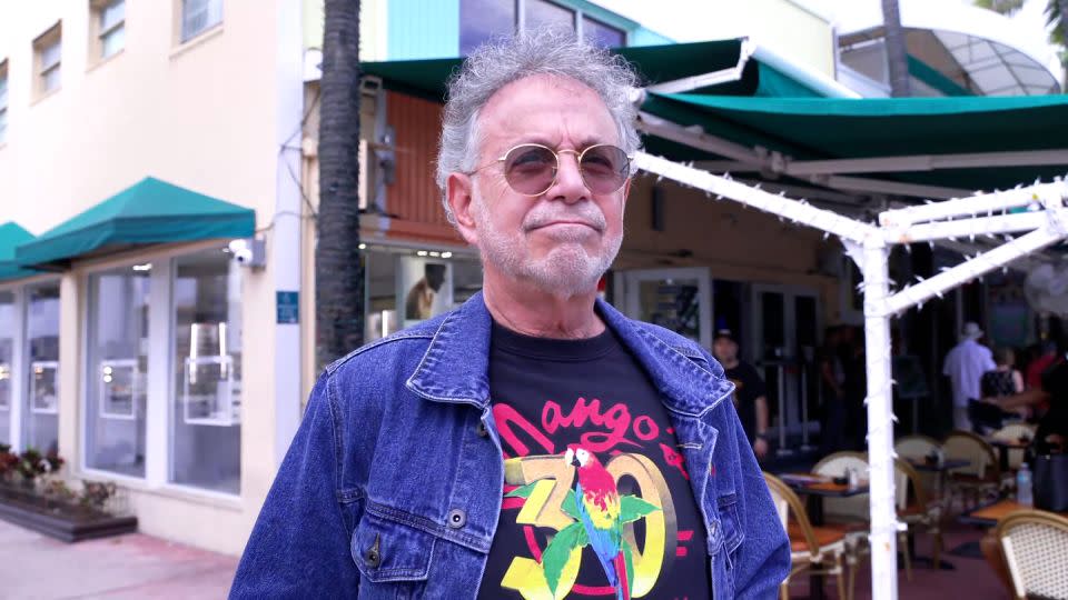 David Wallack outside Mango’s Tropical Cafe on Ocean Drive in South Beach. - CNN