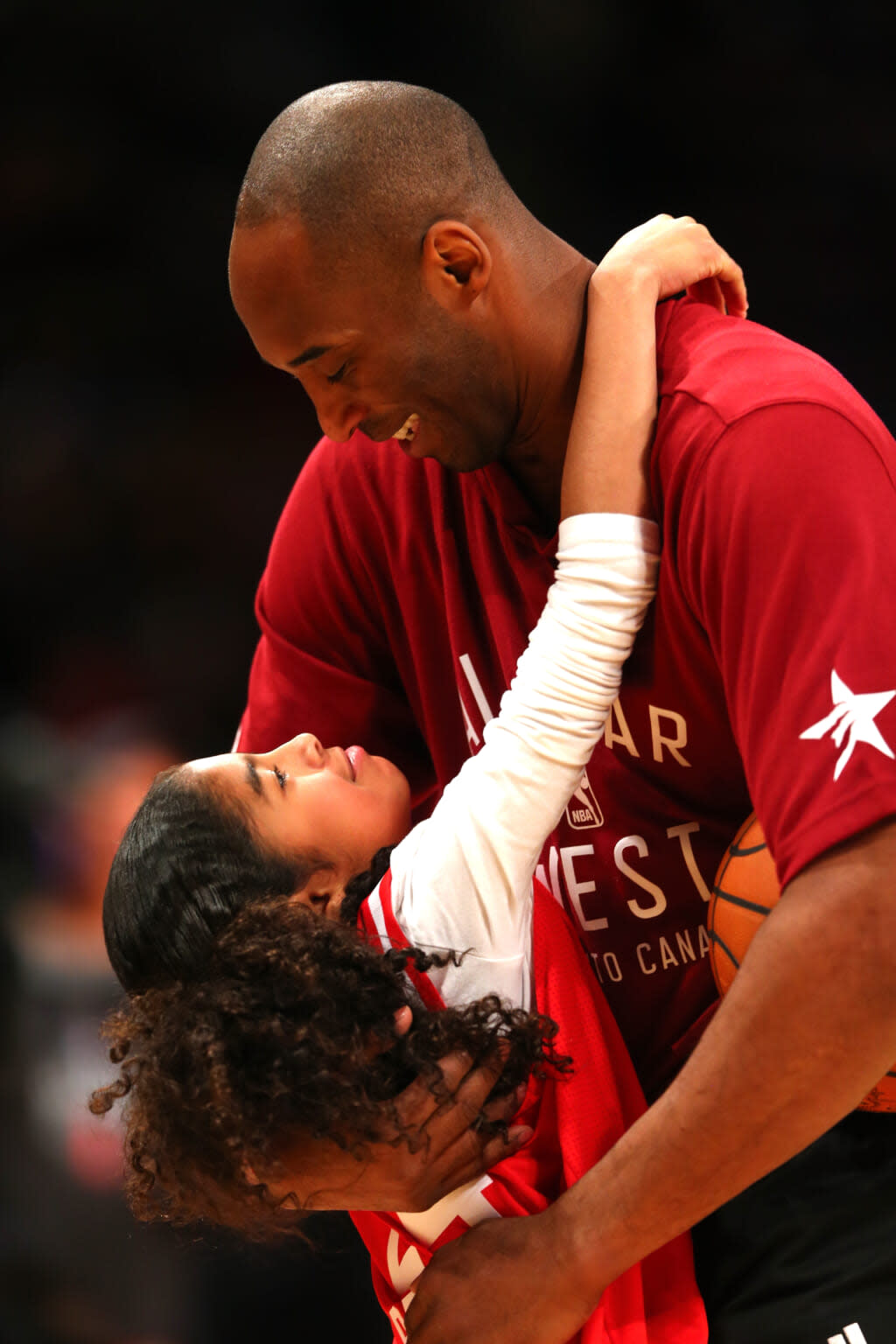 Kobe Bryant #24 of the Los Angeles Lakers and the Western Conference warms up with daughter Gianna Bryant during the NBA All-Star Game 2016 at the Air Canada Centre on February 14, 2016 in Toronto, Ontario. (Photo by Elsa/Getty Images)