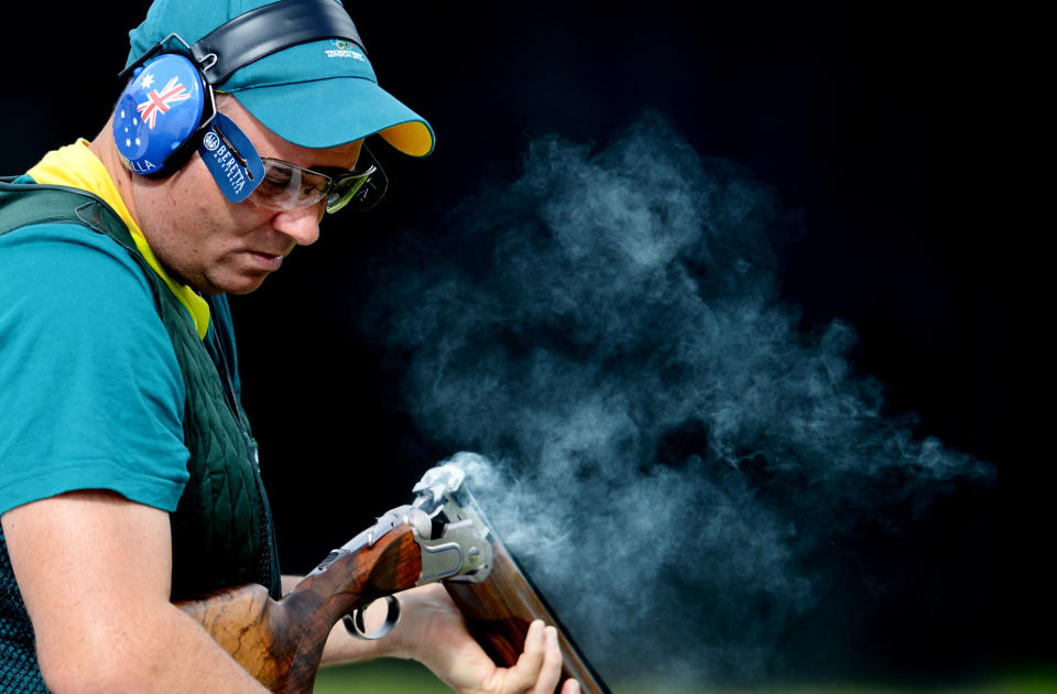 Adam Vella of Australia in the shooting trap men qualification day 1 at the Royal Artillery Barrack during the Olympic Games in London, Sunday, Aug. 5, 2012. (AAP Image/Tracey Nearmy) NO ARCHIVING