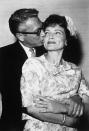 <p>The couple got married in a small ceremony at the Sands Hotel in Las Vegas on June 14, 1963. Betty wore a brocade scoop-neck suit and a white ruffled hatband.</p> 