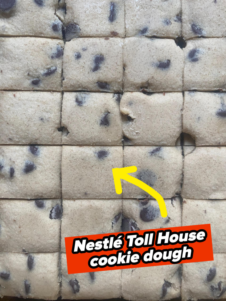 Close-up of pre-portioned chocolate chip cookie dough cut into squares