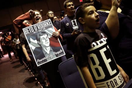 FILE PHOTO: Supporters of U.S. Rep. Beto O'Rourke (D-TX), candidate for U.S. Senate attend a campaign rally on the last day before the U.S. 2018 midterm elections at the University of Texas El Paso in El Paso, Texas, U.S., November 5, 2018. REUTERS/Mike Segar/Files