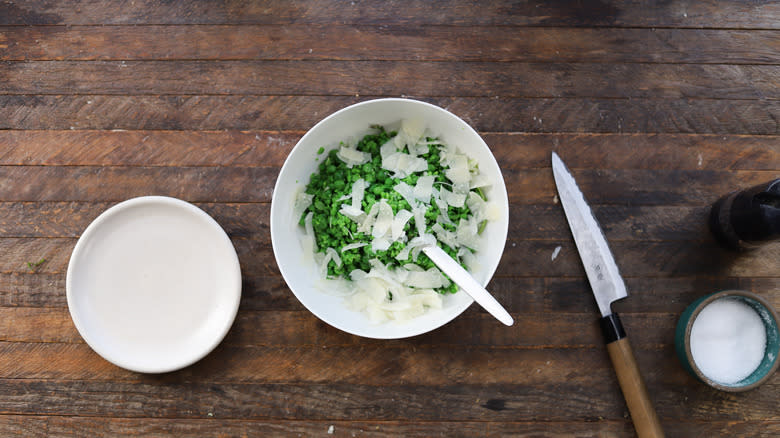 Bowl with peas and cheese