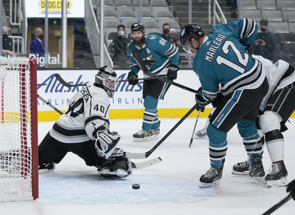 San Jose Sharks center Patrick Marleau (12) scores a goal past Los Angeles Kings goaltender Calvin Petersen (40) during the first period of an NHL hockey game Friday, April 9, 2021, in San Jose, Calif. (AP Photo/Tony Avelar)