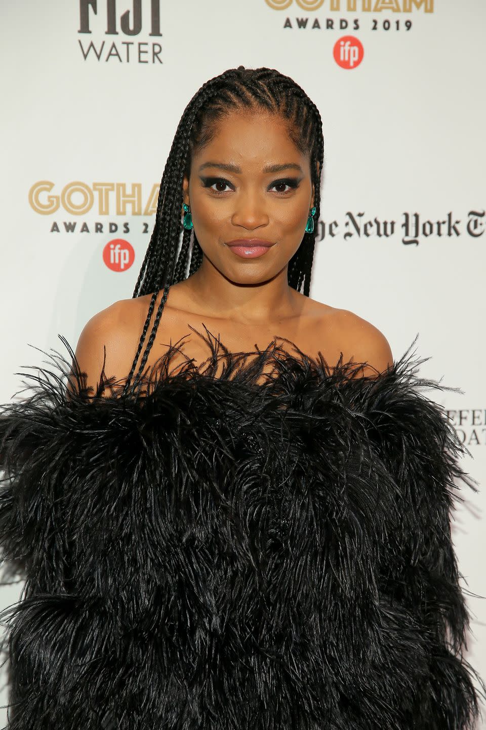 <p>Have your cornrows parted off to the side, as seen here on Keke Palmer. It adds extra dimension to the look.</p>