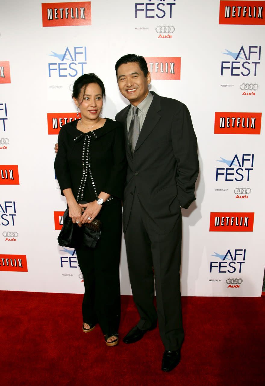 HOLLYWOOD - NOVEMBER 12: Actor Chow Yun Fat and wife Jasmine Tan arrive for the closing night gala presentation of the film 'Curse of the Golden Flower' during AFI FEST 2006 presented by Audi held at Arclight Theatre on November 12, 2006 in Hollywood, California. (Photo by Michael Buckner/Getty Images)