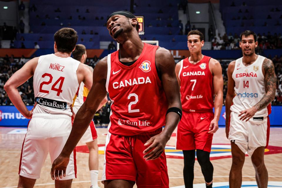 Canada’s Shai Gilgeous-Alexander (2L) reacts during the FIBA Basketball World Cup group L match between Spain and Canada at Indonesia Arena in Jakarta on September 3, 2023. (Photo by Yasuyoshi CHIBA / AFP) (Photo by YASUYOSHI CHIBA/AFP via Getty Images)