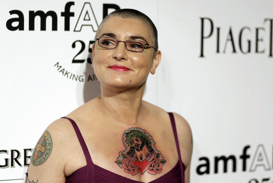 FILE - In this Oct. 27, 2011 file photo, Irish musician Sinead O'Connor arrives at amfAR's Inspiration Gala in Los Angeles. O’Connor, the gifted Irish singer-songwriter who became a superstar in her mid-20s but was known as much for her private struggles and provocative actions as for her fierce and expressive music, has died at 56. The singer's family issued a statement reported Wednesday by the BBC and RTE. (AP Photo/Matt Sayles, File)