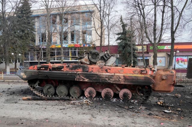 A destroyed armoured personnel carrier stands in the central square of the town of Makariv, 60 kilometres west of Kyiv, Ukraine, after a heavy night battle