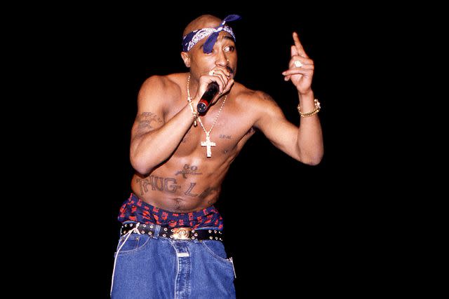 <p>Raymond Boyd/Getty</p> Tupac performs in Chicago in March 1994