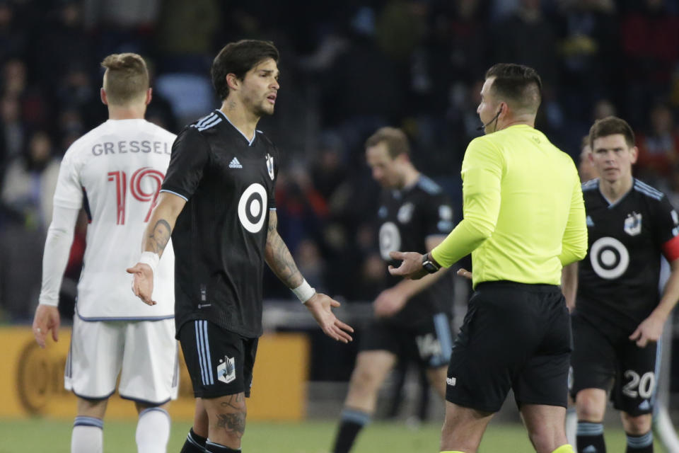 Minnesota United forward Luis Amarilla (9) talks to a referee after the game ended as the Vancouver Whitecaps scored a goal to tie the game 1-1 in extra minutes of the second half of an MLS soccer game Saturday, March 25, 2023, in St. Paul, Minn. (AP Photo/Andy Clayton-King)