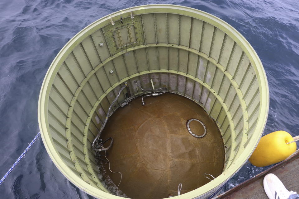 This photo provided by South Korea's Defense Ministry, shows an object salvaged by South Korea's military that is presumed to be part of the North Korean space-launch vehicle that crashed into sea following a launch failure in waters off Eocheongdo island, South Korea Wednesday, May 31, 2023. (South Korea Defense Ministry via AP)