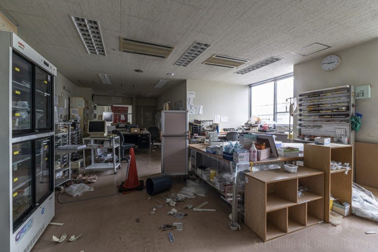 Papers strewn everywhere in an abandoned Fukushima hospital.