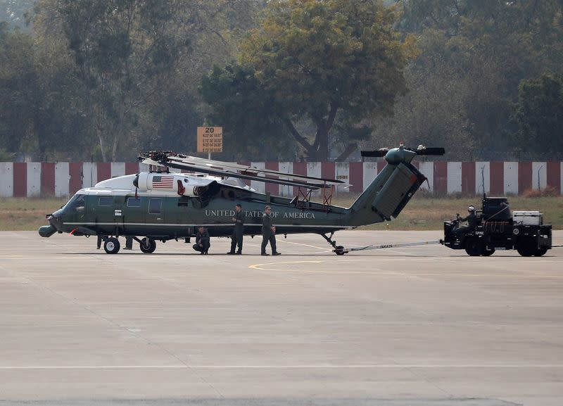 A U.S. military chopper sits on the tarmac after it was unloaded from a cargo aircraft at Sardar Vallabhbhai Patel International airport ahead of the US President Donald Trump's visit, in Ahmedabad