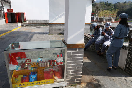 Tour guides in replica red army uniforms are seen at a 'red tourism' site featuring Chinese Communism, in Shazhou village, Rucheng county, Hunan province, China December 3, 2018. Picture taken December 3, 2018. REUTERS/Shu Zhang