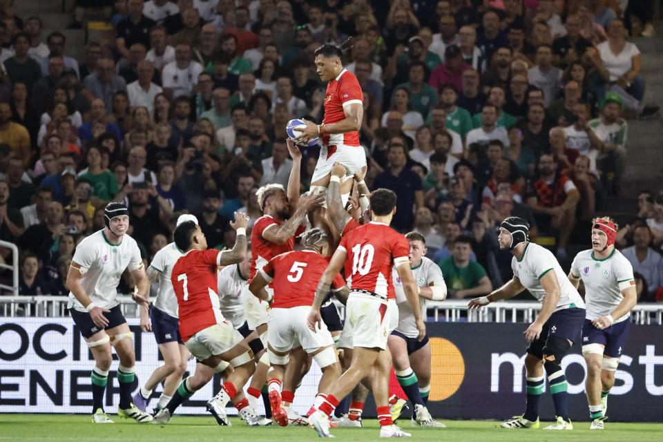 Tonga's Sam Lousi wins a line out during the Rugby World Cup Pool B match between Ireland and Tonga at the Stade de la Beaujoire in Nantes, France, Saturday, Sept. 16, 2023. (AP Photo/Jeremias Gonzalez)