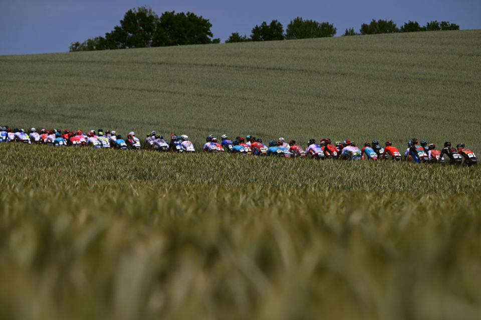 VILLARSSUROLLON SWITZERLAND  JUNE 13 A general view of the peloton passing through a landscape during the 86th Tour de Suisse 2023 Stage 3 a 1438km stage from Tafers to VillarssurOllon 1256m  UCIWT  on June 13 2023 in VillarssurOllon Switzerland Photo by Dario BelingheriGetty Images