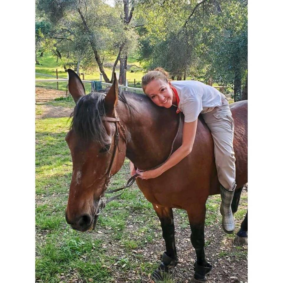 Sam and Sacramento County sheriff’s deputy Lt. Christie Lynn are pictured in an undated photo.