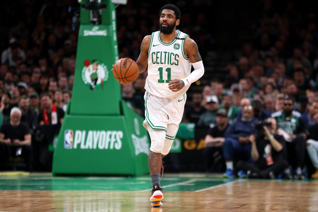 BOSTON, MASSACHUSETTS - MAY 06: Kyrie Irving #11 of the Boston Celtics dribbles against the Milwaukee Bucks during the second quarter of Game 4 of the Eastern Conference Semifinals during the 2019 NBA Playoffs at TD Garden on May 06, 2019 in Boston, Massachusetts. (Photo by Maddie Meyer/Getty Images)