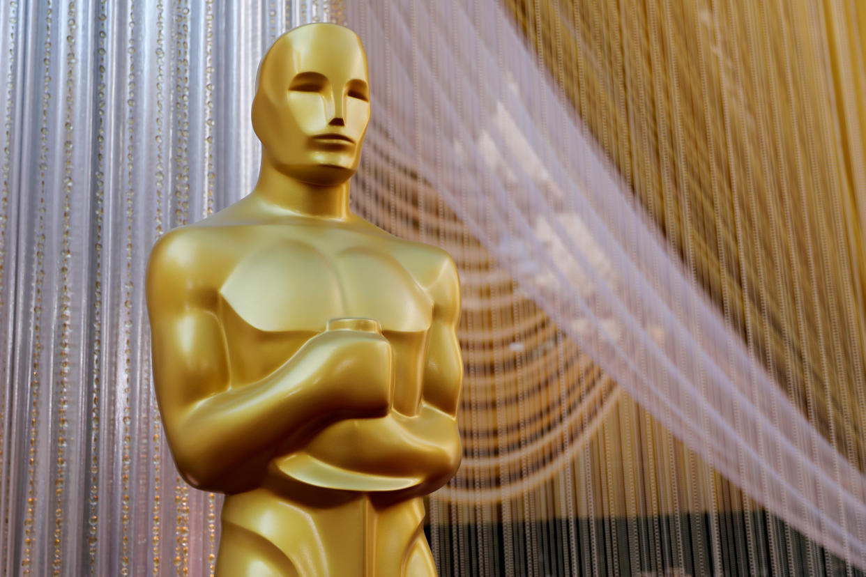 An Oscar statue stands along the red carpet arrivals area in preparation for the 92nd Academy Awards in Los Angeles, California, U.S., February 8, 2020.     REUTERS/Mike Blake     TPX IMAGES OF THE DAY