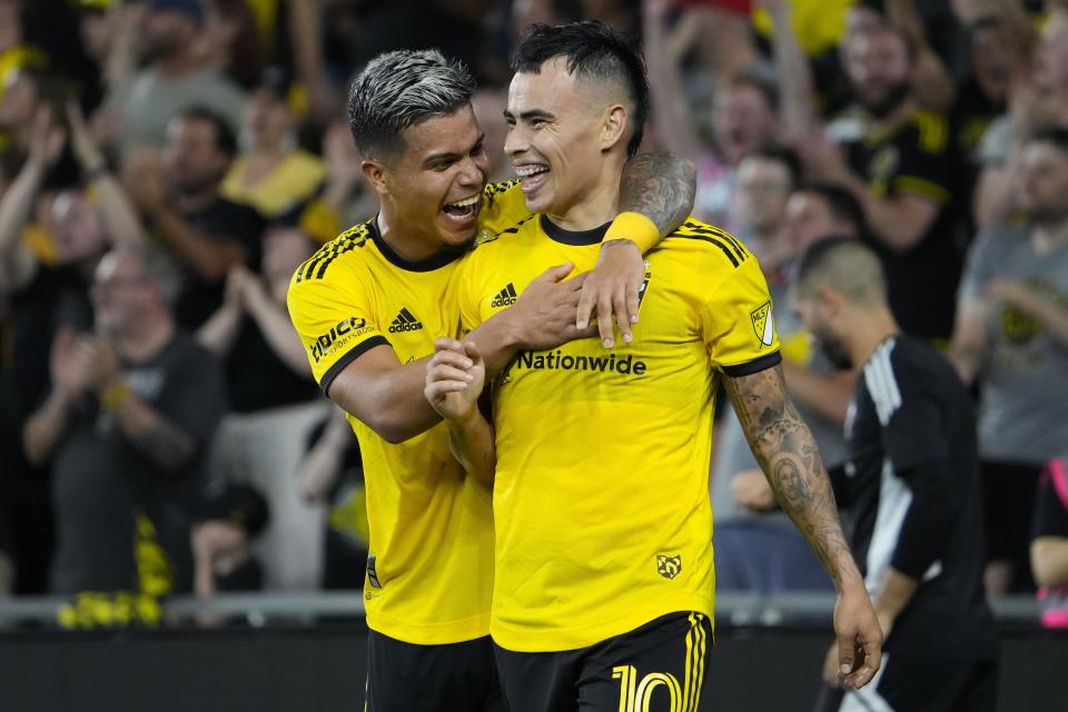 Aug 6, 2022; Columbus, Ohio, USA; Columbus Crew midfielder Lucas Zelarayan (10) reacts to scoring a goal with forward Cucho Hernandez (9) during the second half of the MLS game against New York City FC at Lower.com Field. The Crew won 3-2. Mandatory Credit: Adam Cairns-The Columbus Dispatch