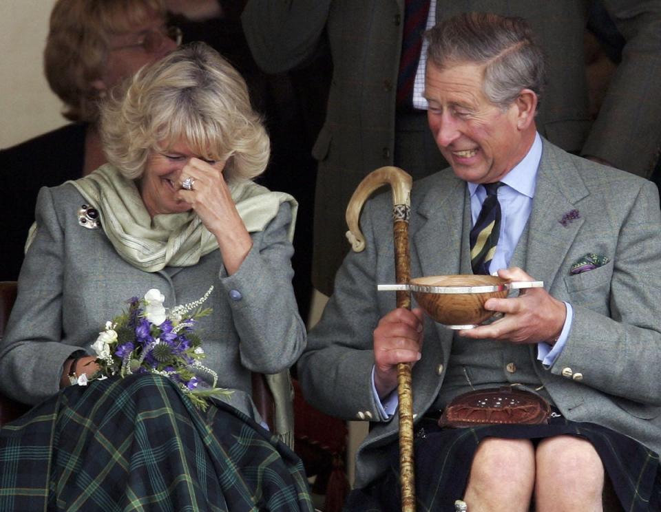 Prince Charles and Camilla drink whisky from a Quaich given to them a s a wedding gift at the 2005 Mey Games (Getty Images)