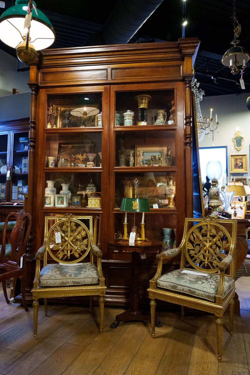 An antique book case that once belonged to the Stillman Ranch is displayed alongside other 18th and 19th century antiques at Tod Carson Antiques in Scottsdale on Aug. 31, 2023.