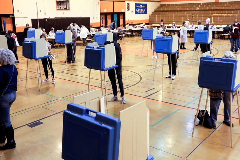 FILE PHOTO: Voters cast ballots during the presidential primary election in Wisconsin