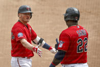 Minnesota Twins' Josh Donaldson celebrates with Miguel Sano (22) his solo home run against the Detroit Tigers in the first inning of the first game of a baseball doubleheader Friday, Sept. 4, 2020, in Minneapolis. (AP Photo/Bruce Kluckhohn)