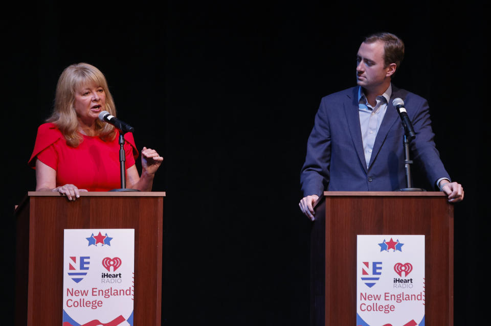 FILE - New Hampshire Republican 1st Congressional District candidate Gail Huff-Brown, left, speaks as Matt Mowers looks on during a debate, Sept. 8, 2022, in Henniker, N.H. New Hampshire will hold its primary on Tuesday, Sept. 13. (AP Photo/Mary Schwalm, File)