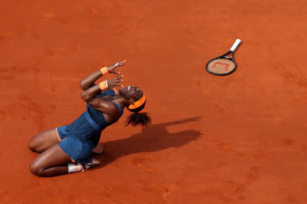 Williams celebrates a match point in a game against Russia's Maria Sharapova during the French Open in Paris on June 8, 2013. (Photo: Julian Finney via Getty Images)