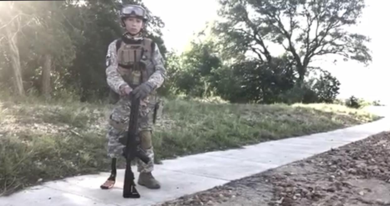 Diego Mercado in his military uniform and Airsoft gun. (Photo: Jason Mercado)