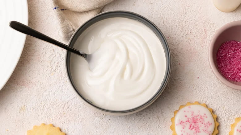 lemon icing with a spoon