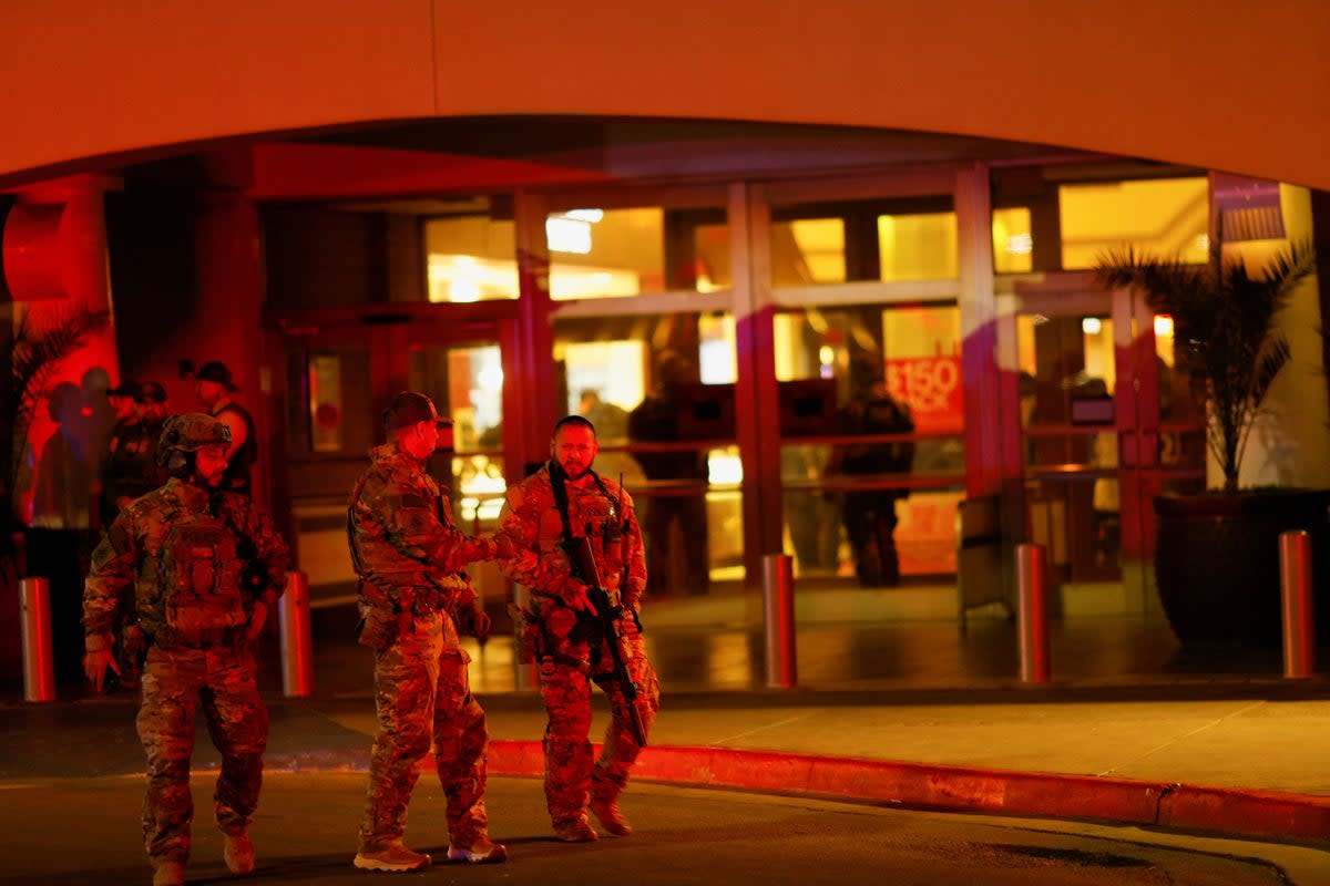 Law enforcement members are seen outside the Cielo Vista Mall after the shooting (REUTERS)