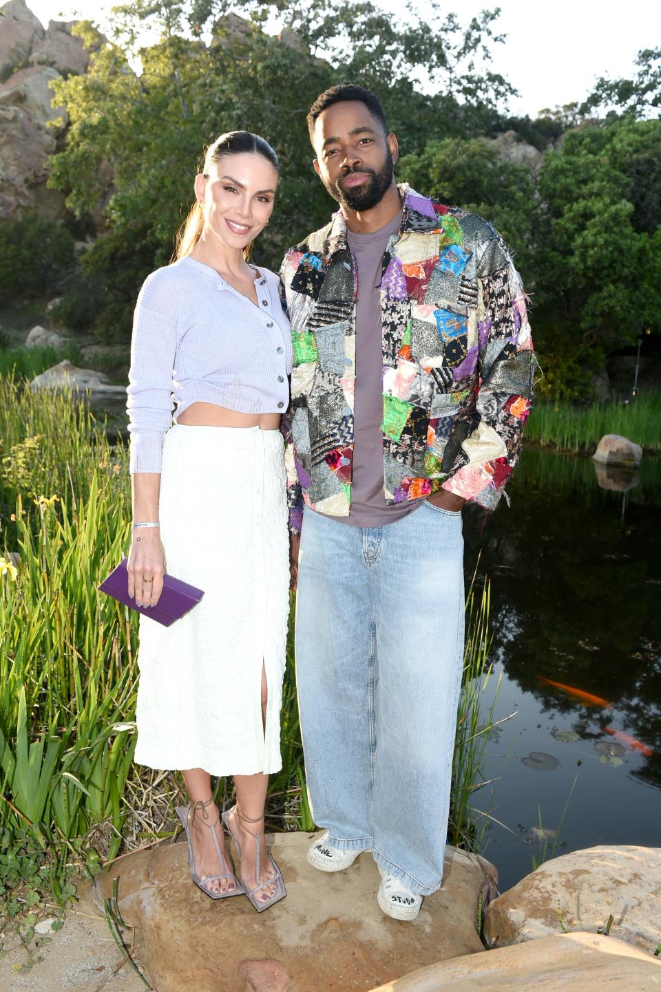 Nina Senicar, left, and Jay Ellis attend as Acne Studios Los Angeles celebrates the launch of the Angelo Plessas Capsule Collection on April 28, 2022.