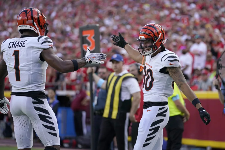 Cincinnati Bengals wide receiver Andrei Iosivas (80) is congratulated by Ja'Marr Chase (1) after catching a touchdown pass during the first half of an NFL football game against the Kansas City Chiefs Sunday, Sept. 15, 2024, in Kansas City, Mo. (AP Photo/Ed Zurga)