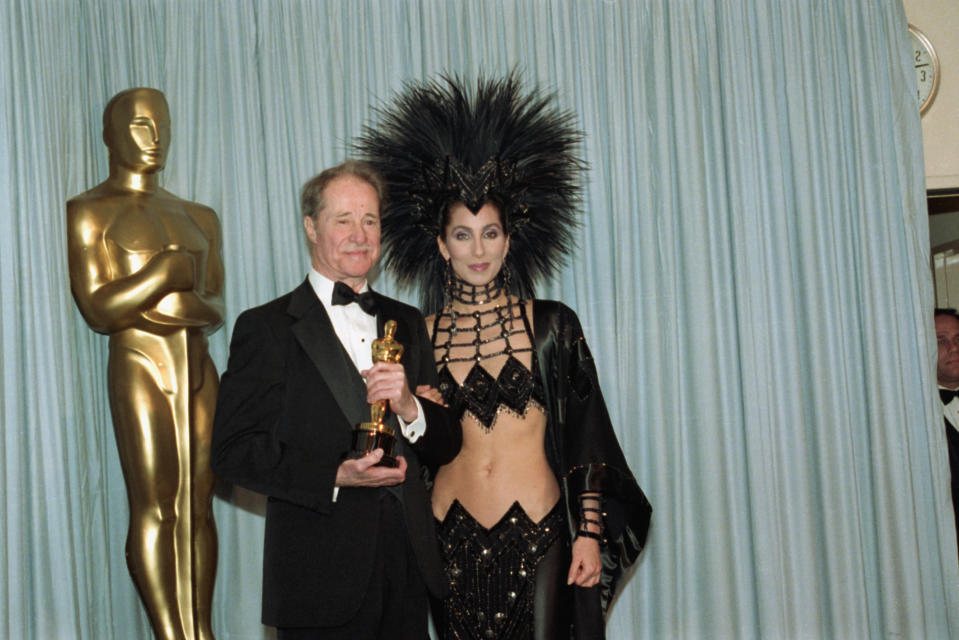 Cher pictured at the 1986 Oscars with Best Supporting Actor Oscar winner Don Ameche. [Photo: Getty]