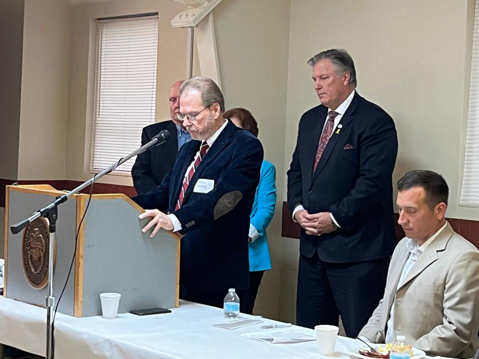Sen. Joey Hensley, R-Hohenwald, reads a proclamation, with (back) Rep. Scott Cepicky, R-Culleoka, declaring the Biffle Potts Farm in Hampshire, Tenn. as the Maury County Century Farm of the Year at the annual Farm Breakfast at the Ridley 4-H Center hosted by Maury Alliance on Friday, April 26, 2024.