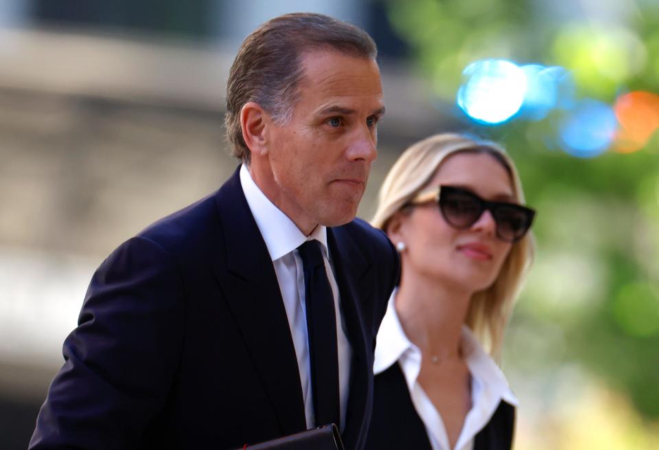 Hunter Biden, son of President Joe Biden, joined by his wife Melissa Cohen Biden, arrive to the J. Caleb Boggs Federal Building on June 10, 2024 in Wilmington, Delaware. The trial for Hunter Biden's felony gun charges resumes today with the defense's team.