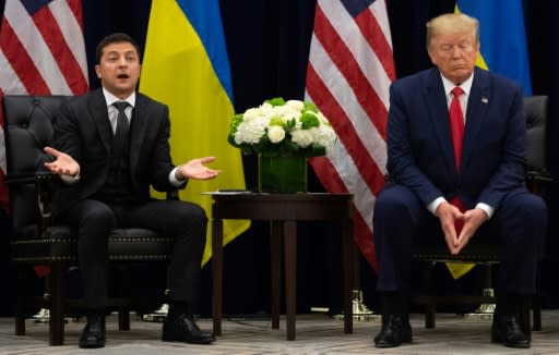 Ukrainian President Volodymyr Zelensky (L) was allegedly pressured by President Donald Trump to investigate political rival Joe Biden
