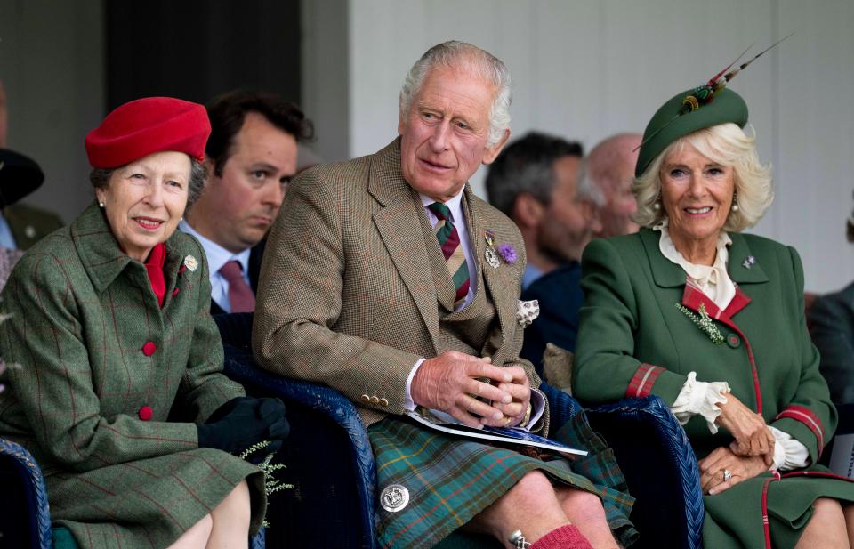 From left: Princess Anne, then-Prince Charles, and Camilla, then-Duchess of Cornwall attend the Braemar Highland Gathering on September 3, 2022, in Braemar, Scotland.