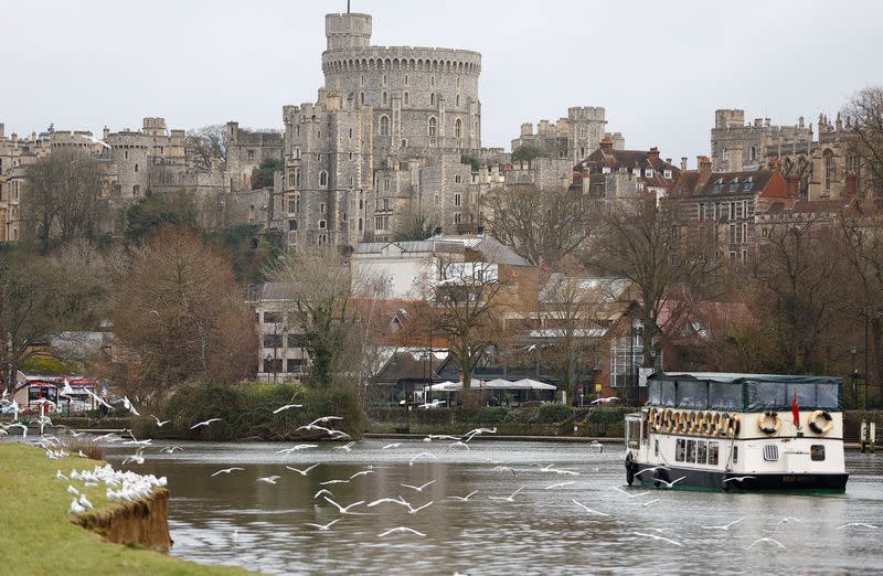 FILE PHOTO: A leisure cruiser is seen on the River Thames near Windsor Castle, in Eton