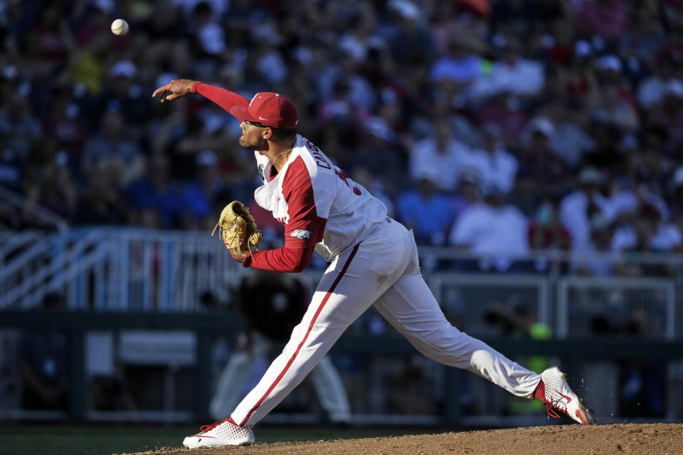 Arkansas starting pitcher Isaiah Campbell delivers against Florida State in the fourth inning of an NCAA College World Series baseball game in Omaha, Neb., Saturday, June 15, 2019. (AP Photo/Nati Harnik)