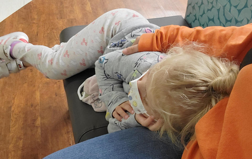 Jade Templin, 4, trying to get some sleep in the emergency waiting room. (Courtesy Shelby Templin)