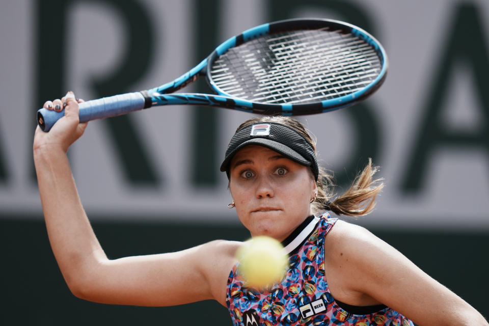 United States's Sofia Kenin plays a return to Maria Sakkari of Greece during their fourth round match on day 9, of the French Open tennis tournament at Roland Garros in Paris, France, Monday, June 7, 2021. (AP Photo/Thibault Camus)