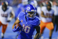 Boise State wide receiver Billy Bowens (18) turns upfield with the ball after a reception against Oklahoma State during the first half of an NCAA college football game Saturday, Sept. 18, 2021, in Boise, Idaho. (AP Photo/Steve Conner)