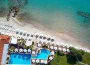 <p>At beachfront <a href="https://www.booking.com/hotel/gr/afitis.en-gb.html?aid=2070929&label=halkidiki-hotels" rel="nofollow noopener" target="_blank" data-ylk="slk:Afitis Boutique Hotel;elm:context_link;itc:0" class="link ">Afitis Boutique Hotel</a> in the confusingly named/spelled Afytos, white parasols line the sand and there’s a backdrop of lush greenery. The hotel overlooks the Gulf of Toroneos, with Aegean-facing terraces and balconies in some of the rooms. It’s a great Halkidiki hotel for diving in the area’s clear waters. Above ground, enjoy an Apivita treatment or a dip in an outdoor hot tub at the spa.</p><p>Kitchen gardens supply many of the vegetables to the chefs. It also has an impressive wine list.</p><p><a class="link " href="https://www.booking.com/hotel/gr/afitis.en-gb.html?aid=2070929&label=halkidiki-hotels" rel="nofollow noopener" target="_blank" data-ylk="slk:BOOK A STAY;elm:context_link;itc:0">BOOK A STAY</a></p>