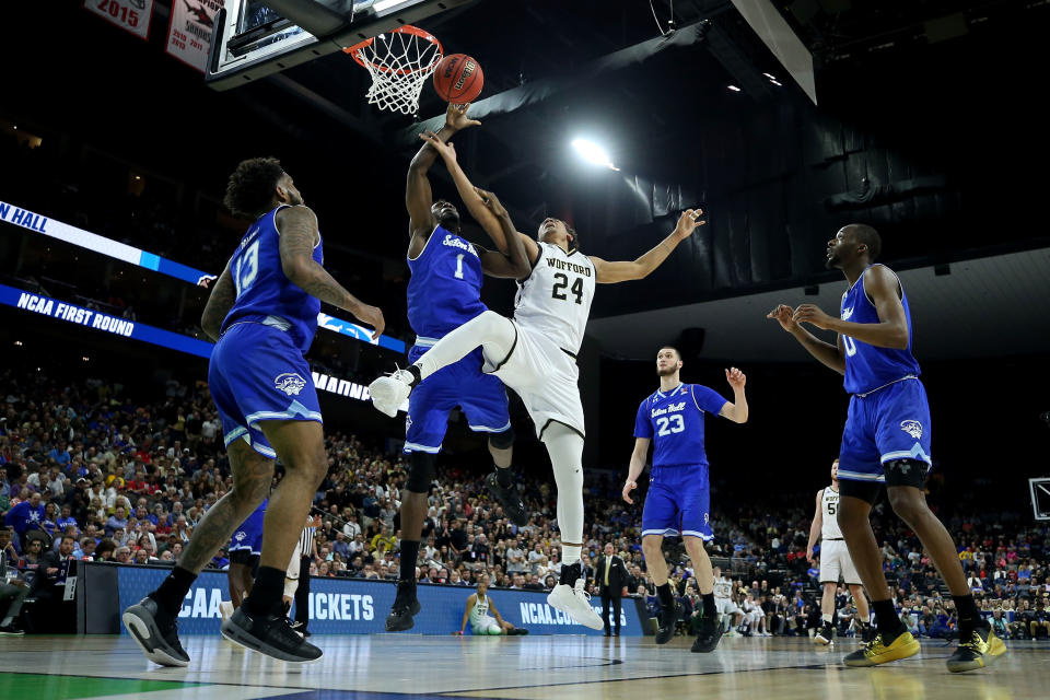 <p>Keve Aluma #24 of the Wofford Terriers attempts a shot while being guarded by Michael Nzei #1 of the Seton Hall Pirates in the first half during the first round of the 2019 NCAA Men’s Basketball Tournament at Jacksonville Veterans Memorial Arena on March 21, 2019 in Jacksonville, Florida. </p>