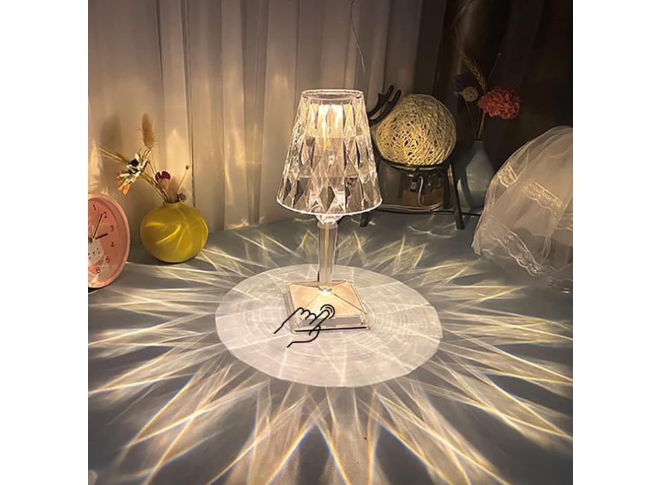 For those that love crystals and sparking lights, this is the lamp for you. (Source: Amazon)


