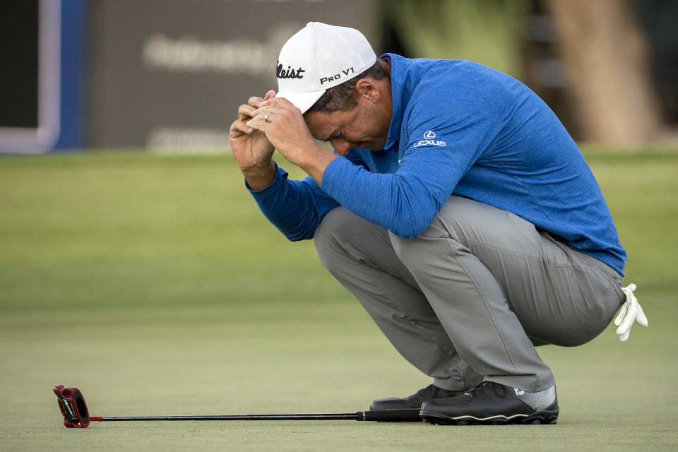 Charles Howell III reacts after winning a playoff against Patrick Rodgers on the 18th green in the final round of the RSM Classic golf tournament on Sunday, Nov. 18, 2018, in St. Simons Island, Ga. (AP Photo/Stephen B. Morton)